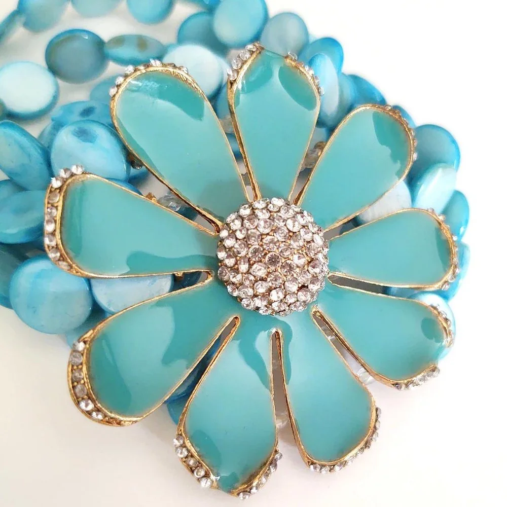 Dyed shell stretch bracelet w/enamel flower& cz's